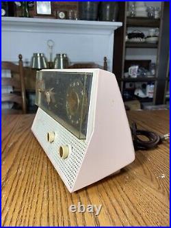 1959 Westinghouse H710T5 Mid Century Atomic Pink Vintage Radio Clock Bakelite