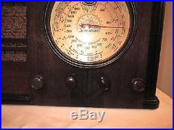 Antique Silvertone vintage tube radio in wood cabinet restored and working