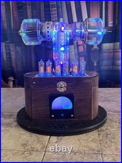 Nixie Clock IN-14 Retro Steampunk. With Vintage Vacuum Tubes From Radio History Nixie Clock IN-14 Retro Steampunk. With Vintage Vacuum Tubes From Radio History