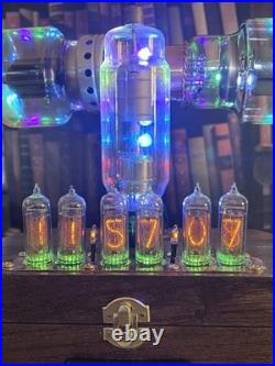 Nixie Clock IN-14 Retro Steampunk. With Vintage Vacuum Tubes From Radio History Nixie Clock IN-14 Retro Steampunk. With Vintage Vacuum Tubes From Radio History
