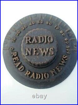 VINTAGE RADIO NEWS CAST IRON 1920's NEWS STAND PAPERWEIGHT LOOK