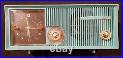 Vintage Turquoise Motorola SC13B Tube AM Radio w Clock made in USA WORKS